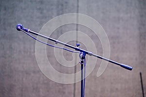 Stand and microphone on a festival stage