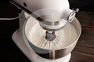 Stand Mixer with a Whisk Attachment in Beaten Egg Whites