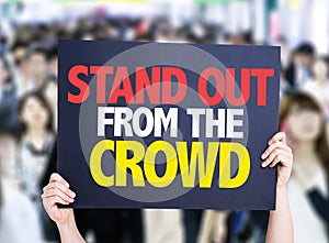Stand Out From the Crowd card with crowd of people on background photo