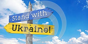 Stand with Ukraine - wooden signpost with two arrows