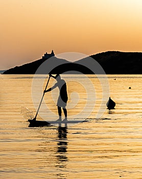 Stand up paddle board man