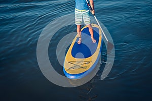 Stand up paddle board man paddleboarding