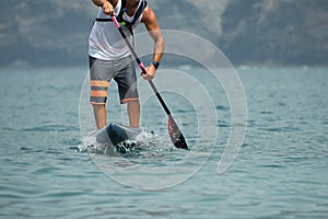 Stand up paddle board man paddleboarding