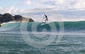 Stand Up Paddle Boarding In Japan During a sunrise and sunset after a typhoon