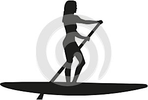Stand up paddle woman photo