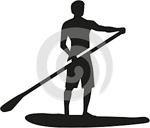 Stand up paddling silhouette