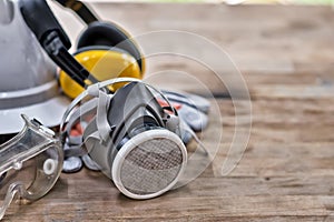 Standard construction safety equipment on wooden table. top view