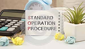 Standard Operating Procedure text on paper