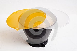 Standard reflector with matt white and yellow diffuser on a white background. Different diffusers for light temperatures.