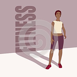 Standing afro american woman. Sport girl casting a shadow of fitness word. Young woman wearing workout clothes. Sport