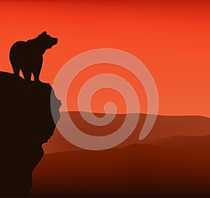 Standing bear at sunset cliff vector silhouette lanscape