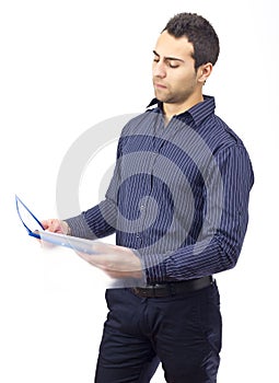 Standing business man reading contract