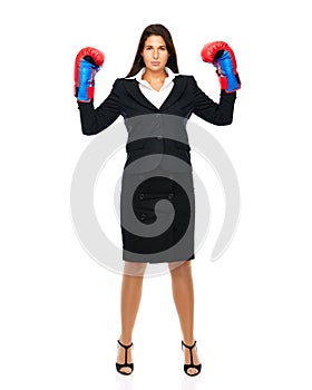 Standing business woman boxing