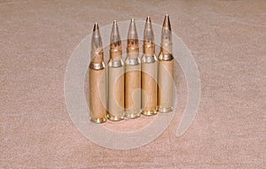 The standing cartriges 308 Winchester caliber with full metal jacket bullets steel case