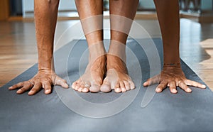 Standing Forward Bend pose in yoga iyengar, Uttanasana fold pose close up front view