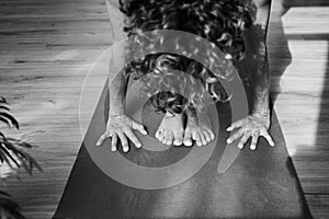Standing Forward Bend pose in yoga iyengar, Uttanasana fold pose close up front view