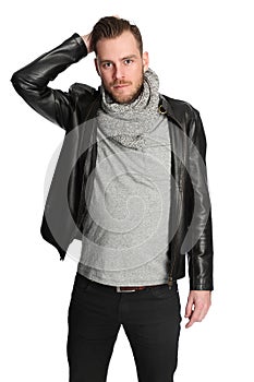 Standing man with scarf and leather jacket