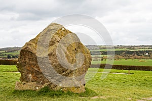 Standing megalithic stone at Newgrange photo