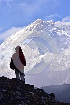 Standing at mount Nuptse. Trekker looking