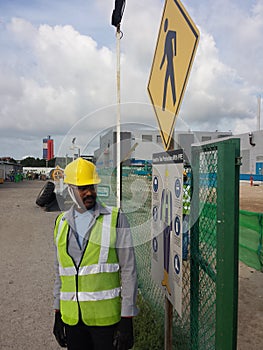 standing by the pole