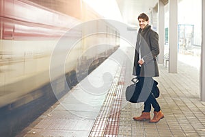 Standing on railway platform