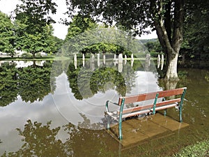 Standing stones in floodwater, with reflections, a ringside seat. photo
