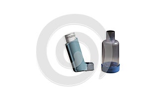 Standing up pictures of inhaler puffer and spacer for Asthmatic person