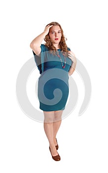 Standing woman in turquoise dress.