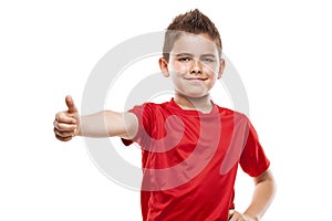 Standing young cool boy doing thumbs-up