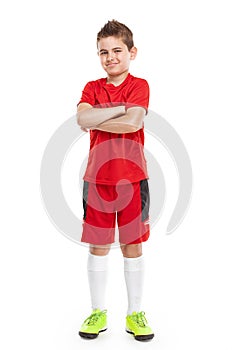 Standing young soccer player in sportswear