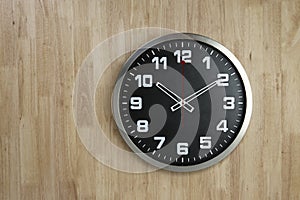 Standless Clock on Wooden Background