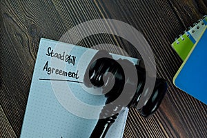 Standstill Agreement write on a book isolated on office desk photo