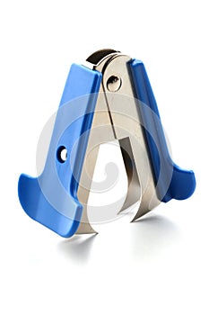 Staple remover on white background