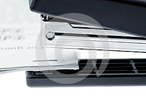 Stapler attach a documents. Isolated on a white.