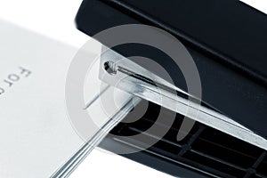 Stapler attach a documents. Isolated on a white.