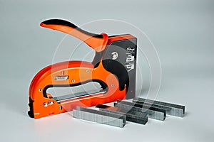 Stapler household, new, orange, reliable with staples