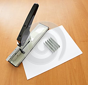 Stapler and staples with paper