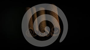 Star anise and cinnamon on black background photo