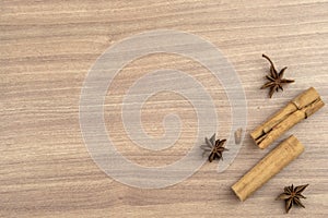 Star anise and cinnamon sticks on wooden backgroundStar anise and cinnamon on wooden background