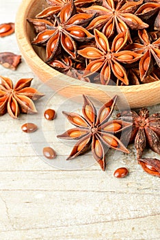 Star anise fruits on the wooden board