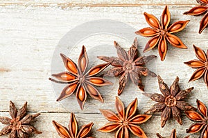 Star anise fruits on the wooden board, top view