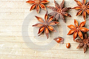 Star anise fruits on the wooden board, top view