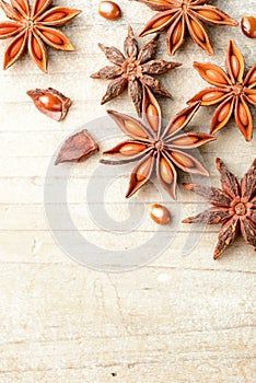 Star anise fruits on the wooden board, top view