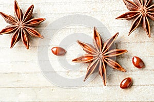 Star anise fruits on the wooden board, top view