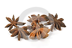 Star anise spice fruits and seeds isolated on white background.