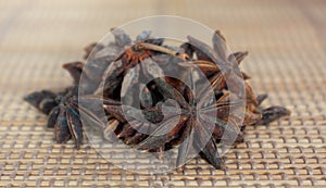 Star anise on straw mat