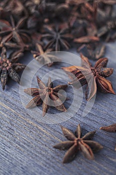 Star anise on wooden background