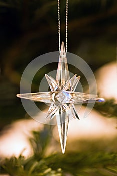 Star as decoration in christmastree photo
