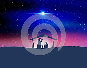 Star of Bethlehem, or the Christmas Star. Silhouettes of Jesus Christ`s family. Colorful sky