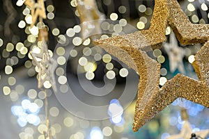 Star Christmas ornament on blurred background